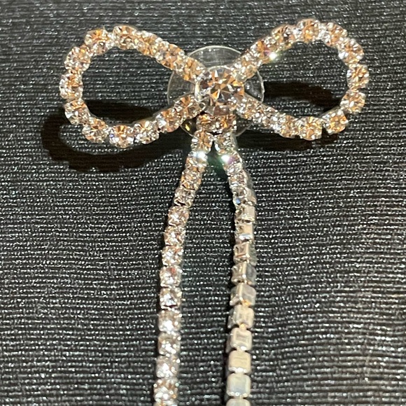 NWT bow rhinestone post earrings with two sets of backings. - Picture 4 of 4